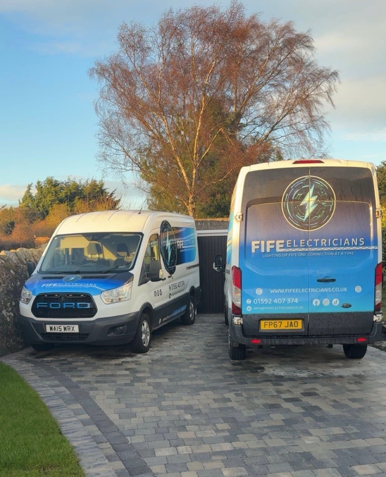 Two Fife Electricians branded vans