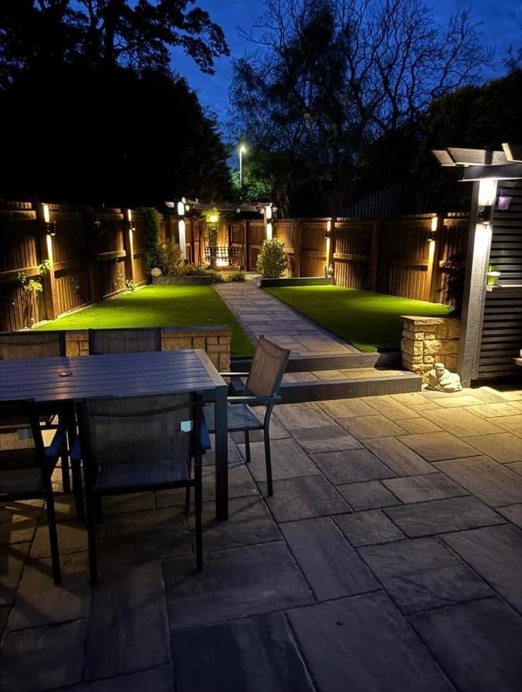 Garden and pergola lighting installation at night in Fife